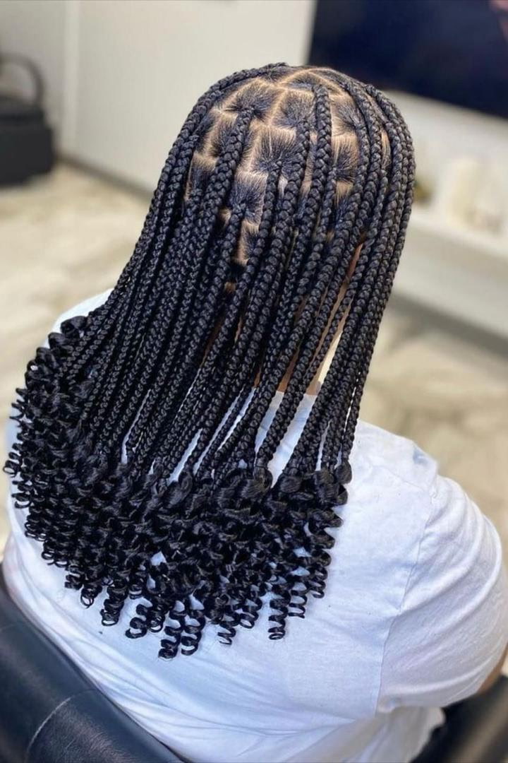 Knotless braids with spiral curly ends